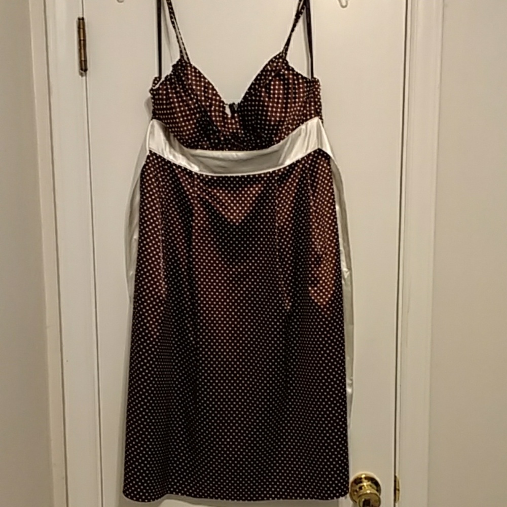 Brown polka dotted satiny dress